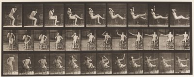プレート247。椅子に足を置いて座る 作： Eadweard Muybridge