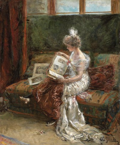 プリントのアルバムを見るレオニー・ガリード 作： Eduardo Leon Garrido