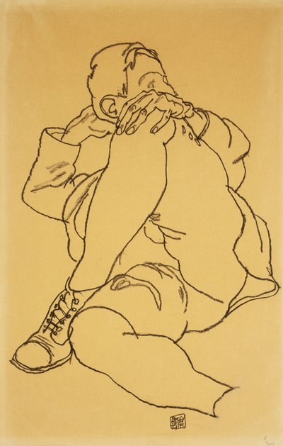 頭を組んだ足で休んでいる若い男。 1918年に頭を下にして左脚を折りたたんでいる横になった少年 作： Egon Schiele