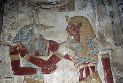ファラオとアヌビス神を描いたレリーフ、セティ1世神殿、オシリス礼拝堂 作： Egyptian 19th Dynasty