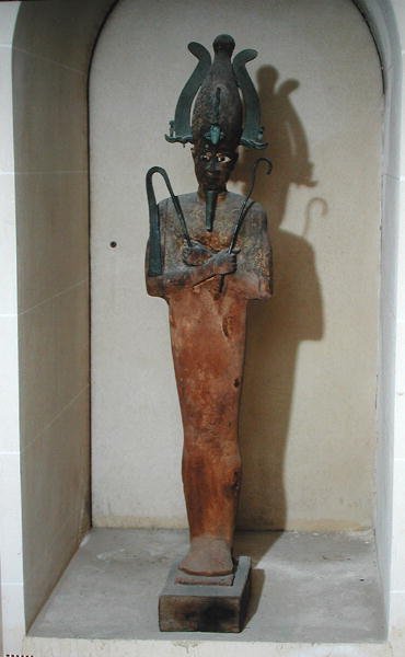 オシリスのカルトの像（塗装された木と青銅） 作： Egyptian Ptolemaic Period