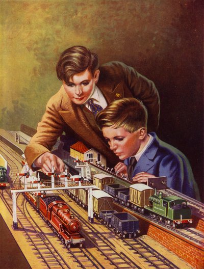 電車のセットで遊ぶ男の子 (カラーリソ) 作： English School