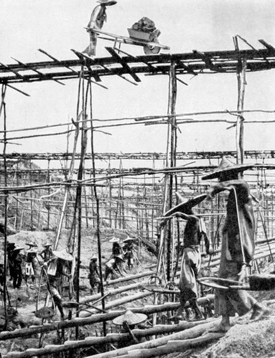 世界で最も豊かなスズ地区、中国のタイピンでの原始的な方法、1936年。 作： Ewing Galloway