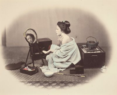 化粧をする女性 作： フェリーチェ・ベアト