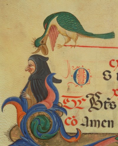 Missal 515 42rマントをかぶった人物の上にとまった幻想的な鳥。装飾された最初のRの詳細と、1449ベラムの詳細の前に実行された合唱団の本の境界線56727 作： Filippo di Matteo Torelli