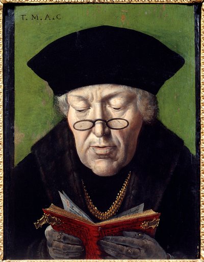 ヒューマニスト、トーマス・モア（1478-1535）の肖像。眼鏡をかけて本を読むヒューマニストが描かれています。フランドル派の絵画 作： Flemish School