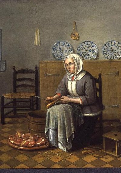 キッチンで料理をする着席女性 作： Franciscus Carree