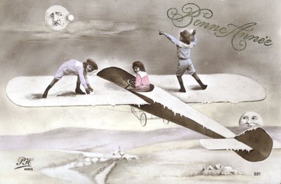 飛行機の中で子供たちと一緒に年賀状を作成（カラー写真 作： French Photographer