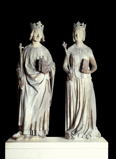 アートフランス。フランス王シャルル5世（賢者シャルル）（1338-1380年）とフランス王妃ジャンヌ・ド・ブルボン（1337-1378年）の彫像。14世紀に作られた石灰岩の彫刻。ルーヴル美術館の東側入口のファサードにあったものと思われます。 作： French School