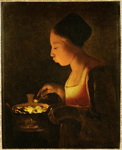 火鉢に息を吹きかける少女（キャンバスに描かれた絵） 作： Georges de la Tour