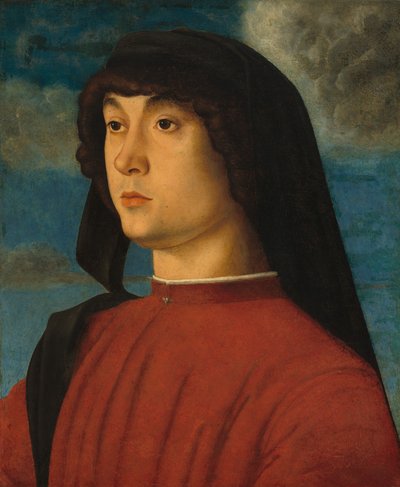 赤い服を着た若い男の肖像 作： Giovanni Bellini