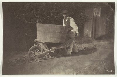 手押し車を持つ男性農民 作： Giraudon