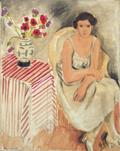 椅子に座る女性 - テーブルの上の花、またはカーネーション 作： Henri Matisse