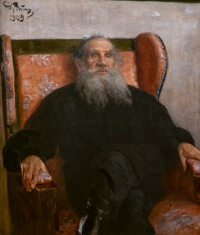 ピンクの肘掛け椅子に座るレオン・トルストイ 作： Ilya Efimovich Repin