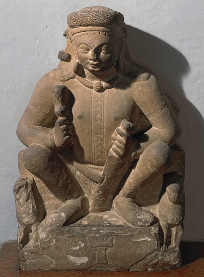 太陽の神、スーリヤ。赤い砂岩の彫刻 作： Indian School