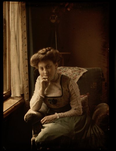 窓辺に座る女性 作： Johannes Hendrikus Antonius Maria Lutz