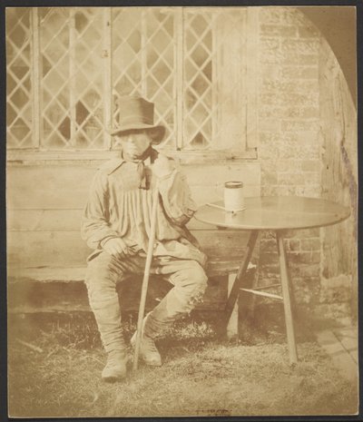 [テーブルに座る男] 作： John Whistler
