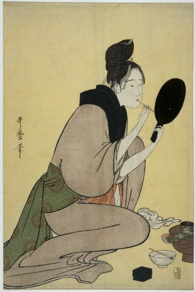 美人画。彼女の唇に化粧を適用する女の子 作： Kitagawa Utamaro