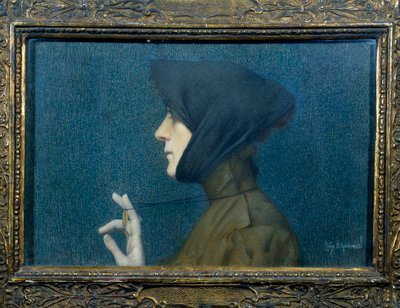 メダルを持つ女性の肖像。ペンダントを前で支える横顔の女性 作： Lucien Levy Dhurmer