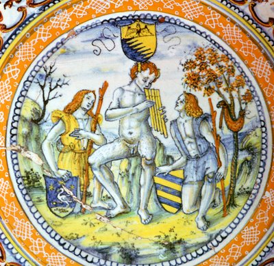 イタリアの陶器の皿には、2人の羊飼いに配管するパンが描かれています。 作： Maestro Benedetto
