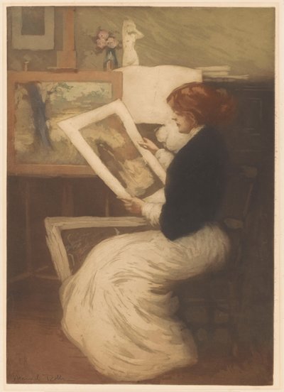 女性は写真を見る 作： Manuel Robbe