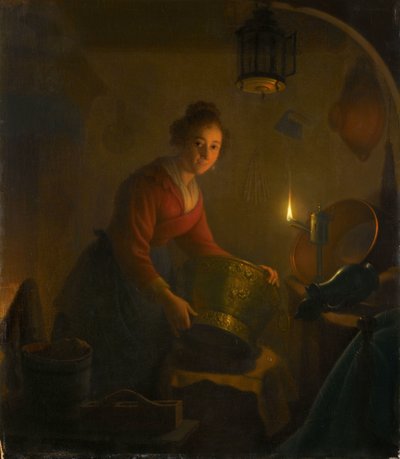キャンドルライトのキッチンにいる女性 作： Michiel Versteegh