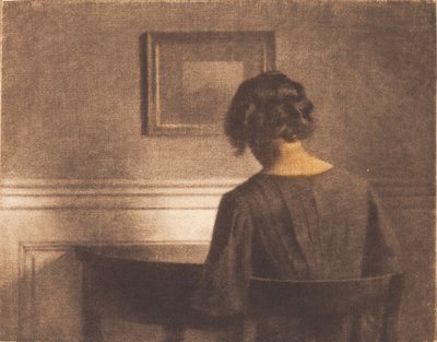 半円形のテーブルのそばの少女 作： Peter Vilhelm Ilsted