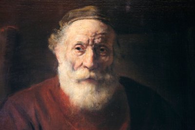 「赤い服を着た老人の肖像」、17 世紀 作： Rembrandt van Rijn
