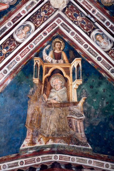 ローマ教会の4人の博士を表現した、上の教会の丸天井の一つを飾るフレスコ画の詳細の図。ミラノの聖アンブローズと福音書記者の聖マルコを描いたもので、14世紀初頭にシエナの学校で制作されました。モナス 作： Sienese School