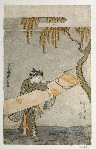 木に取り付けられたかけものを手入れする若い女性。鈴木春信(1725-1770)による日本の版画 作： Suzuki Harunobu