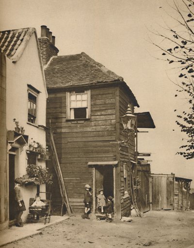 戸口の村人がCoaches Pass。、c1935を見たHighgateの古い家 作： Unbekannt