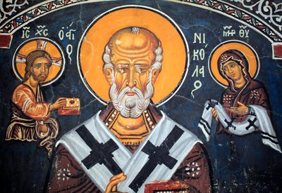 聖ニコラスがキリストとマリアを囲んでいる 14世紀のビザンチン様式のフレスコ画（1332年） ナトヘクス、南壁 フォルビオティサの聖母教会、アシノウ ユネスコのサイト トロードス地方、キプロス 作： Unbekannt