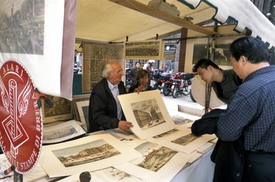 イタリア、ロンバルディア州、ミラノ、カルミネ広場、版画を売る屋台 作： Unbekannt