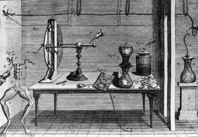 イタリアの物理学者・医師であるルイジ・ガルヴァーニ（1737〜1798）が、カエルの足に電流が流れることを説明した実験の図。 作： Unknown artist