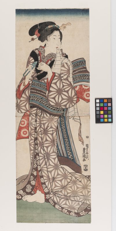 爪を切る女性、1845年頃（サインによる、キュレーター・ノーツを参照）（カラー木版画） 作： Utagawa (1786 1865) Kunisada