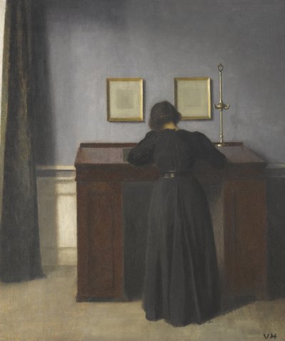机に立っているアイダ 作： Vilhelm Hammershøi