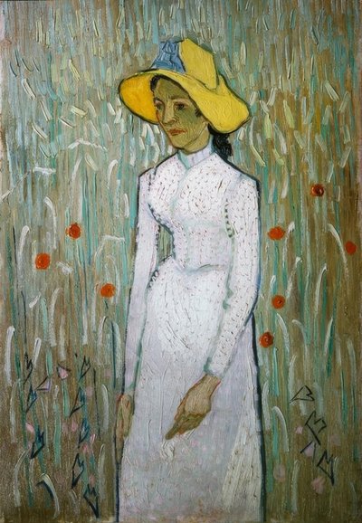 麦畑の前に立っている若い女の子 作： Vincent van Gogh