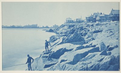 シーサイドリゾートの岩場で釣りをする2人の男性 作： William H. Cades