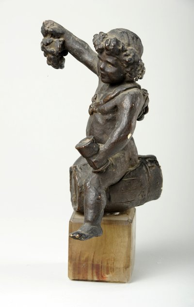 ワイン樽のケルブ（塗られた石膏） 作： William Hamo Thornycroft