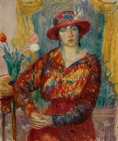 チューリップと赤いブラウスの女性 作： William James Glackens