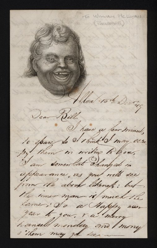 笑う男の顔が描かれた紙に書かれた手紙（彫刻 作： スコットランドの学校