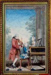 ヴォルフガング・アマデウス・モーツァルト（1756-1791）は、父と妹と一緒にピアノを弾いていた子供の頃の姿。