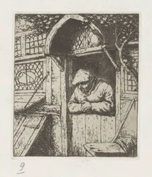 一番下のドアにもたれる農夫