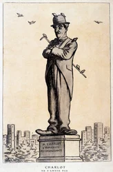台座に文字が書かれた彫像のシャルロ。「Charlot, the grateful humanity" ("Charlot ne s