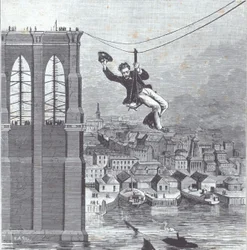 建設中のブルックリン橋。1876年8月25日、2本の鉄塔の間を最初に渡ったのは、建設主任のファリントン氏（写真左）。
