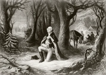 ジョージワシントンは、1777年から78年の冬の間、ヘンリーブリュックナーによる絵画の後、バレーフォージのアメリカ独立戦争の野営地で祈ります