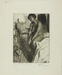 座っている黒人