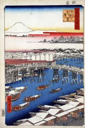 「名所江戸百景」（現在の東京）：降雪後晴れた日本橋または日本橋。 富士山を背景にした日本の東京の街の眺め。 （名所江戸百景 日本橋雪晴）