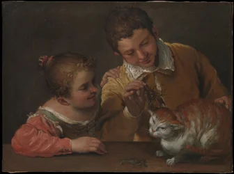 猫をからかう二人の子供