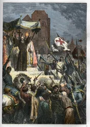 神はそれを望んでいる。クレルモン公会議（現在のオーヴェルニュ地方クレルモン・フェラン（Clermont-Ferrand））で、隠者ペテロ（1050-1115）が教皇ウルバン2世の前で最初の十字軍を説いた。